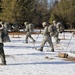 Cold-Weather Operations Course Class 18-05 students practice snowshoeing at Fort McCoy