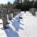 Cold-Weather Operations Course Class 18-05 students practice snowshoeing at Fort McCoy