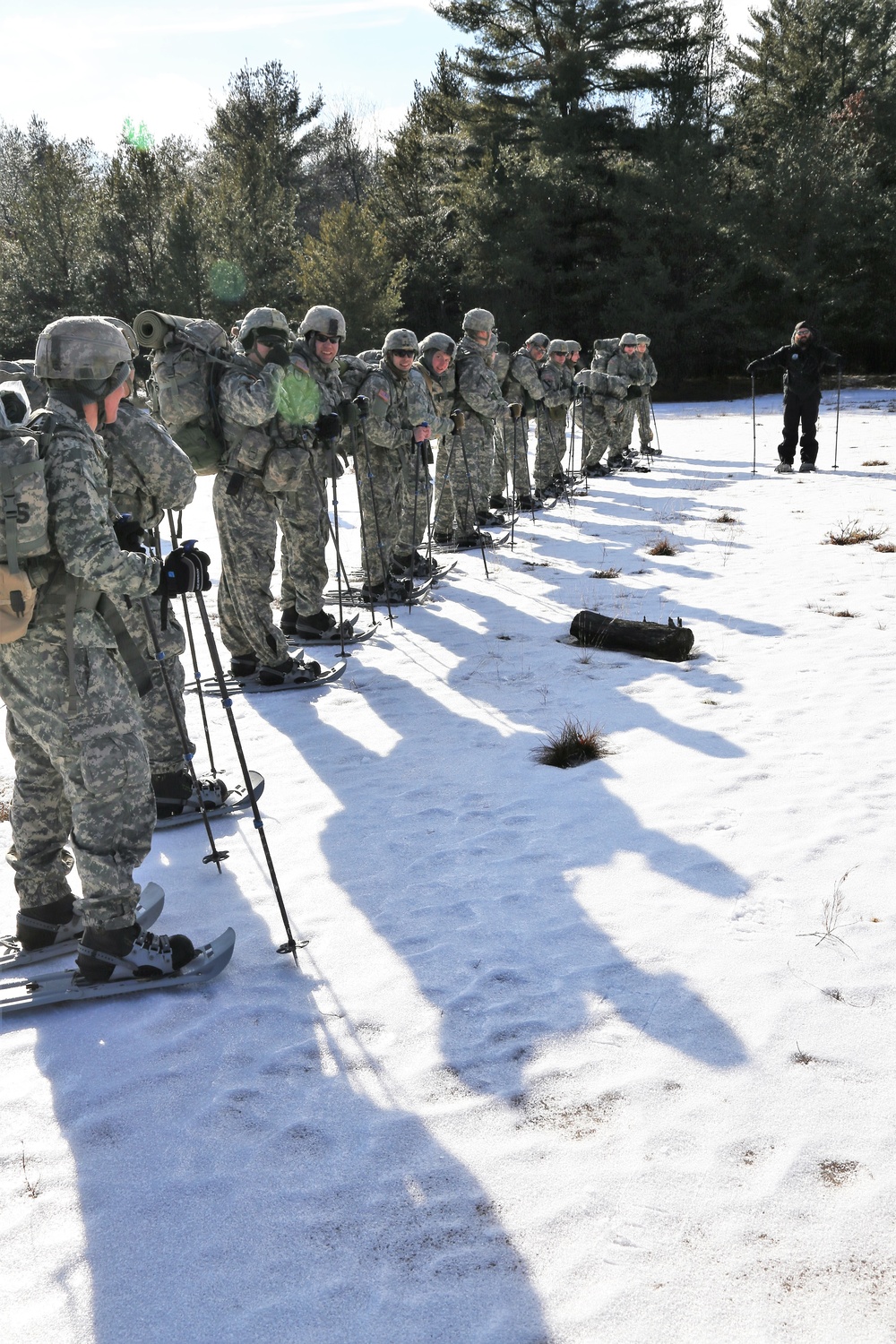 Cold-Weather Operations Course Class 18-05 students practice snowshoeing at Fort McCoy