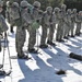 Cold-Weather Operations Course Class 18-05 students practice snowshoeing at Fort McCoy