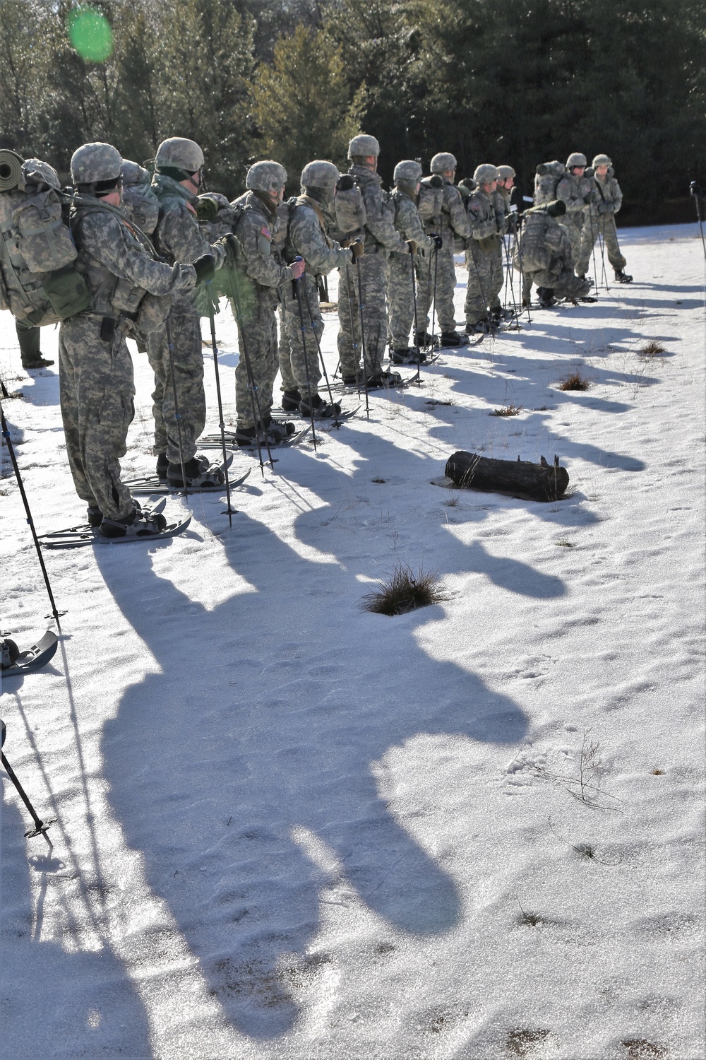 Cold-Weather Operations Course Class 18-05 students practice snowshoeing at Fort McCoy