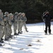 Cold-Weather Operations Course Class 18-05 students practice snowshoeing at Fort McCoy