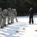 Cold-Weather Operations Course Class 18-05 students practice snowshoeing at Fort McCoy