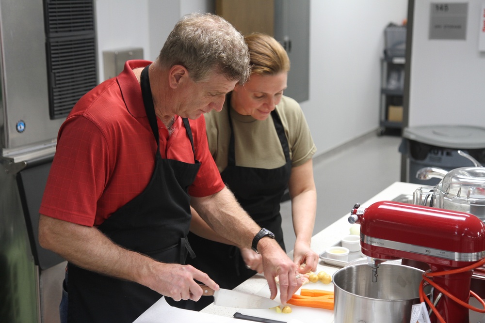 Couples cook together at Vogel Resiliency Center