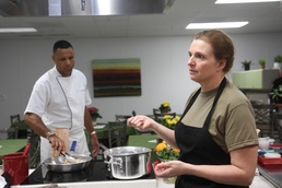 Couples cook together at Vogel Resiliency Center