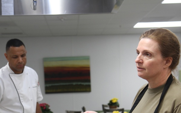 Couples cook together at Vogel Resiliency Center