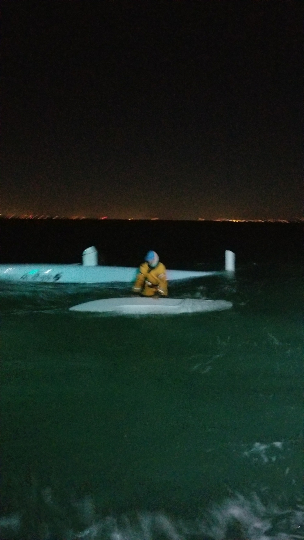Coast Guard rescues man after sailboat capsizes during boat race