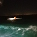 Coast Guard rescues man after sailboat capsizes during boat race