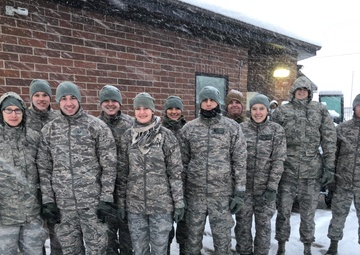 151st SFS members embrace the cold