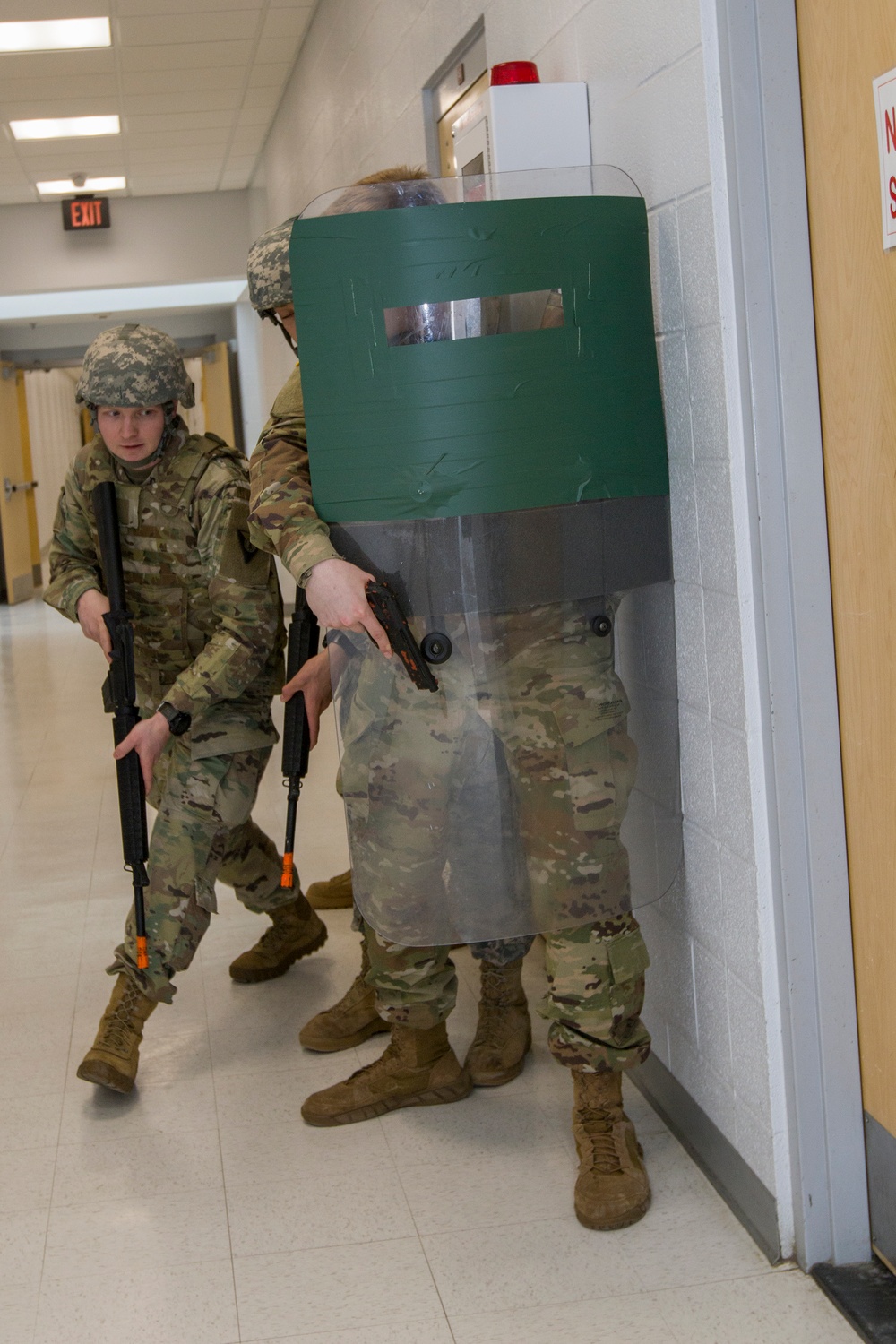 Soldier Moves to Open Door