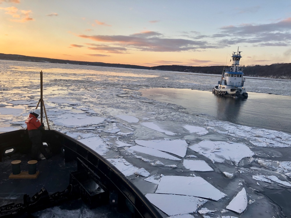 Coast Guard Cutter Penobscot Bay assisting tug in ice