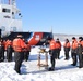 Coast Guard Cutter Penobscot Bay Cutterman's Ceremony while Hove-to in Ice on the Hudson River