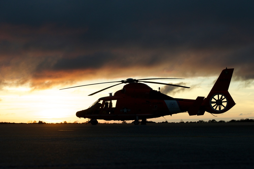 Coast Guard helicopter stands ready