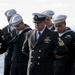 USS America (LHA 6) Sailors bow their heads for chaplain's benediction during a burial at sea ceremony