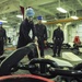 USS America Sailor detaches pelican hook