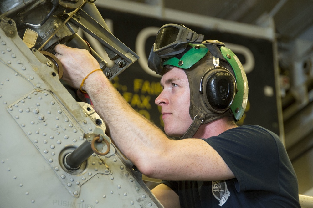 USS Bonhomme Richard (LHD 6) Sailors Conduct Helicopter Maintenance