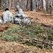 Cold-Weather Operations Course Class 18-05 students build improvised shelters at Fort McCoy