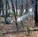 Cold-Weather Operations Course Class 18-05 students build improvised shelters at Fort McCoy