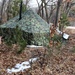 Cold-Weather Operations Course Class 18-05 students build improvised shelters at Fort McCoy