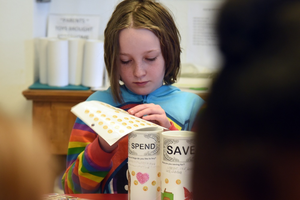 School age children learn to save