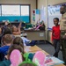 Marines celebrate RAA with children