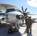 Sailors prepare a E-2C Hawkeye for flight