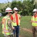 LTC Cunningham speaks with USACE volunteers and contracted line workers in Lares