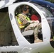 LTC Cunningham prepares to view line work from a helicoptor.