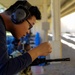 USS San Diego (LPD 22) Sailor Sights In A Rifle