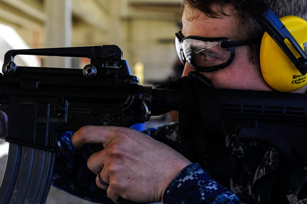 USS San Diego (LPD 22) Sailor Shoots A M4