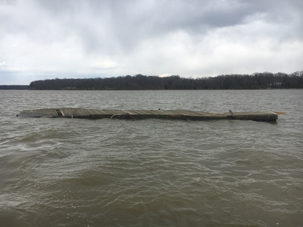 Broken pier floats in Potomac River