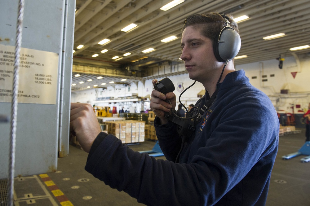 USS America Sailor mans hangar elevator