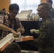 III MEF Marines and Japanese reporters ride in MV-22B Osprey