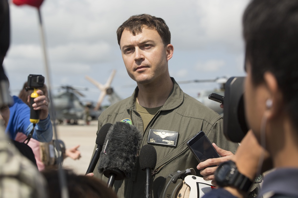 III MEF Marines and Japanese reporters ride in MV-22B Osprey