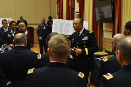 DCNG acting commanding general speaks to warrant officers during reception