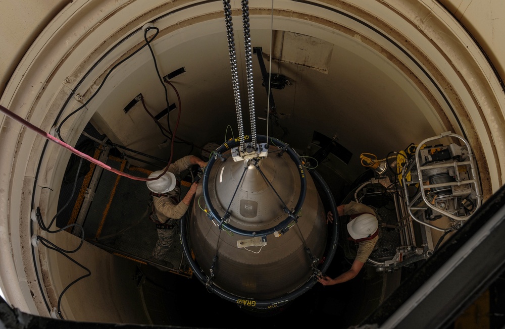 Missile maintainers tear down an ICBM for Maintenance