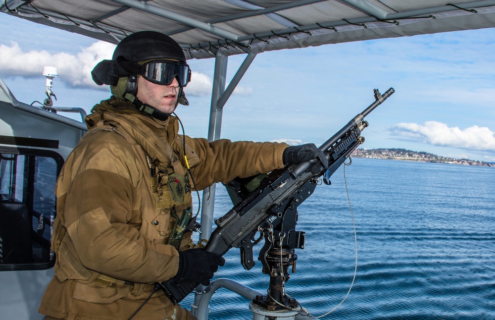 CRS 11 High Value Unit Pacific Northwest escorts USNS Charles Drew (T-AKE-10) in Puget Sound, Wash.
