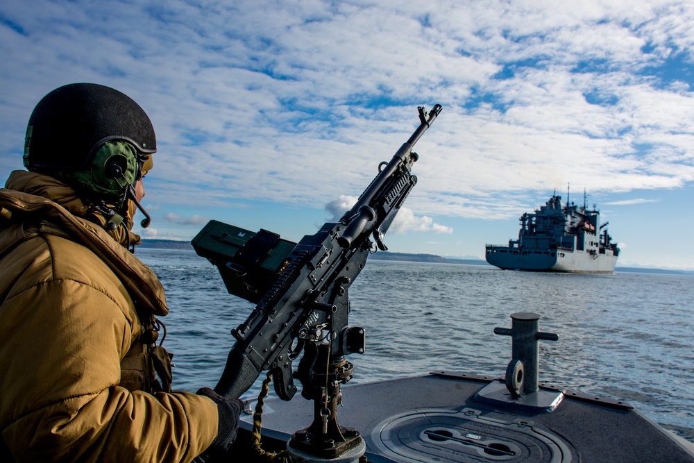 CRS 11 High Value Unit Pacific Northwest escorts USNS Charles Drew (T-AKE-10) in Puget Sound, Wash.