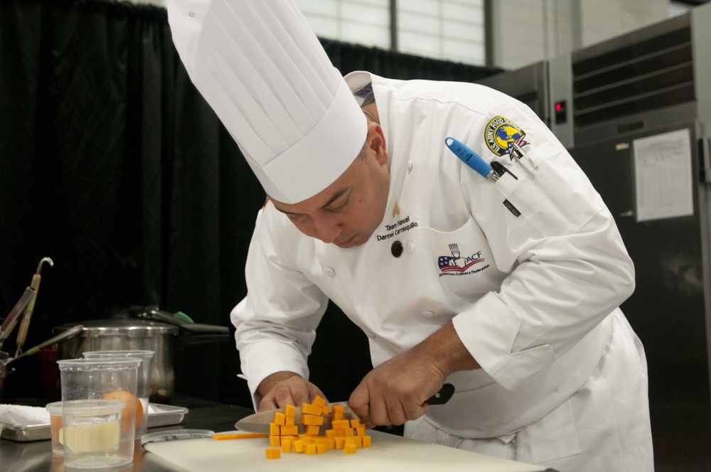 Culinary arts specialist for Team Hawaii meticulously works in the kitchen during 43rd annual Joint Culinary Training Exercise