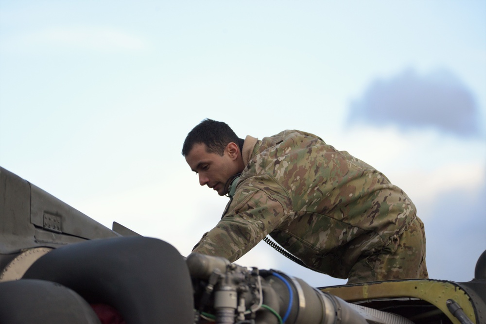 1st Battalion, 3rd Aviation Regiment (Attack Reconnaissance) conduct 500 hours phase maintenance on an AH-64D Apache