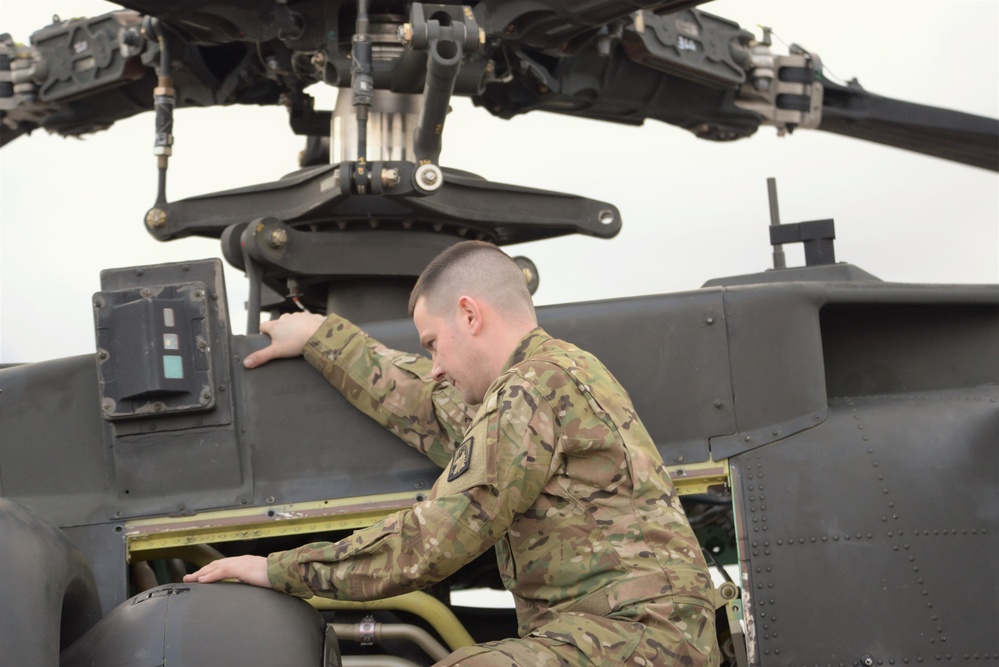 1st Battalion, 3rd Aviation Regiment (Attack Reconnaissance) conduct 500 hours phase maintenance on an AH-64D Apache