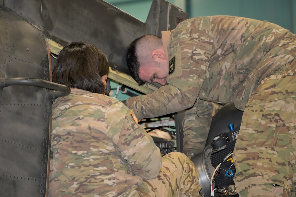 1st Battalion, 3rd Aviation Regiment (Attack Reconnaissance) conduct 500 hours phase maintenance on an AH-64 Apache