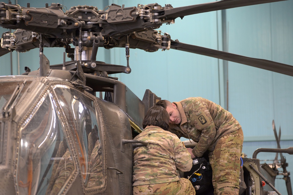 1st Battalion, 3rd Aviation Regiment (Attack Reconnaissance) conduct 500 hours phase maintenance on an AH-64 Apache