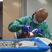 Sailors conduct a dental exam aboard USNS Mercy