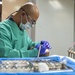 Sailors conduct a dental exam aboard USNS Mercy