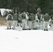 Cold-Weather Operations Course Class 18-06 students prepare for snowshoe training at Fort McCoy