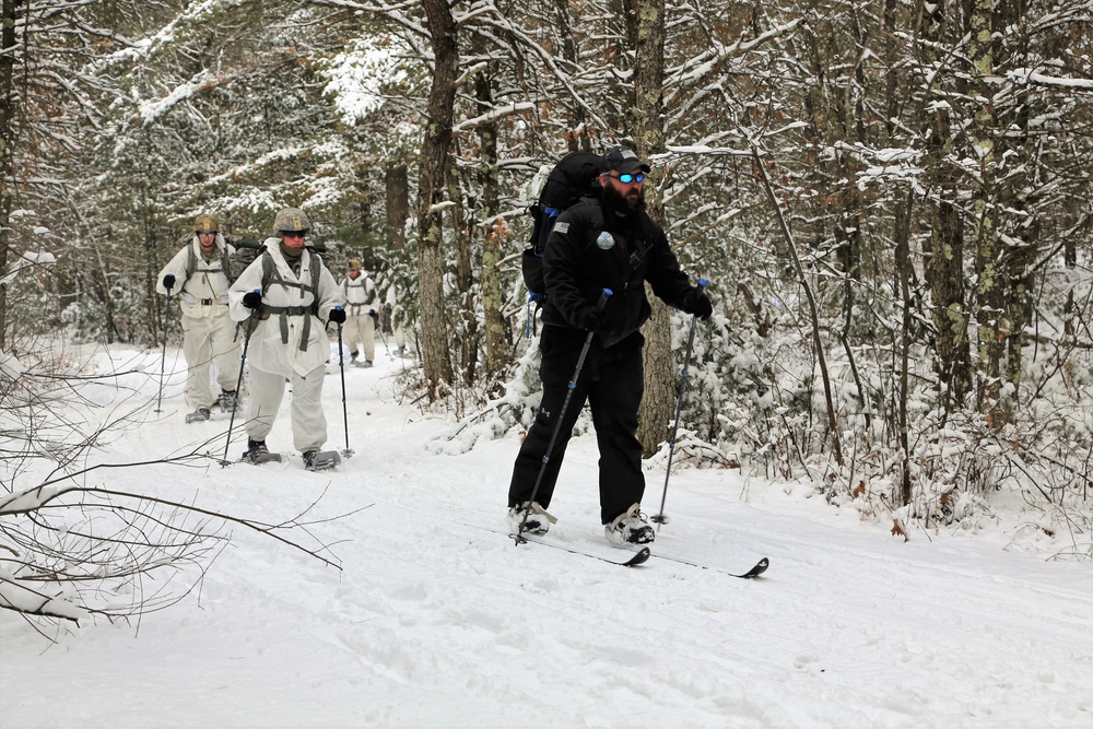 Cold-Weather Operations Course Class 18-06 students practice snowshoeing at Fort McCoy