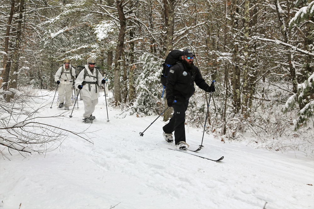 Cold-Weather Operations Course Class 18-06 students practice snowshoeing at Fort McCoy