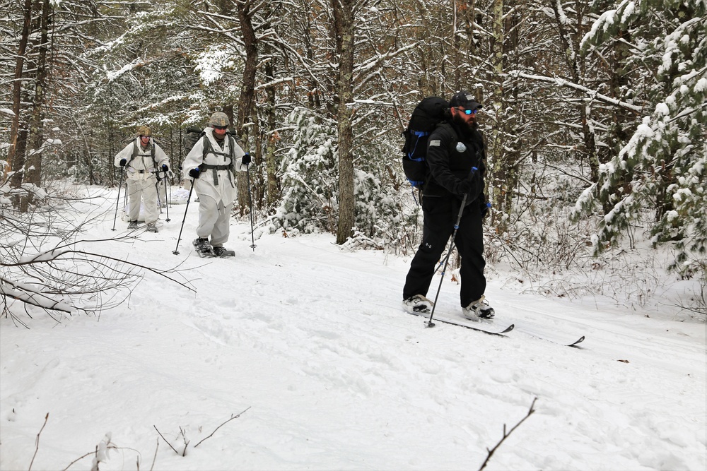 Cold-Weather Operations Course Class 18-06 students practice snowshoeing at Fort McCoy