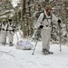 Cold-Weather Operations Course Class 18-06 students practice snowshoeing at Fort McCoy